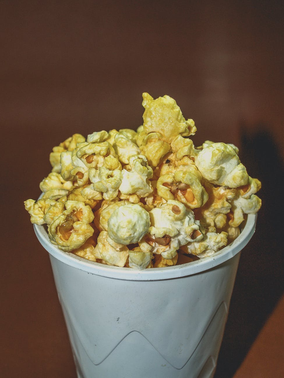 popcorn on disposable cup