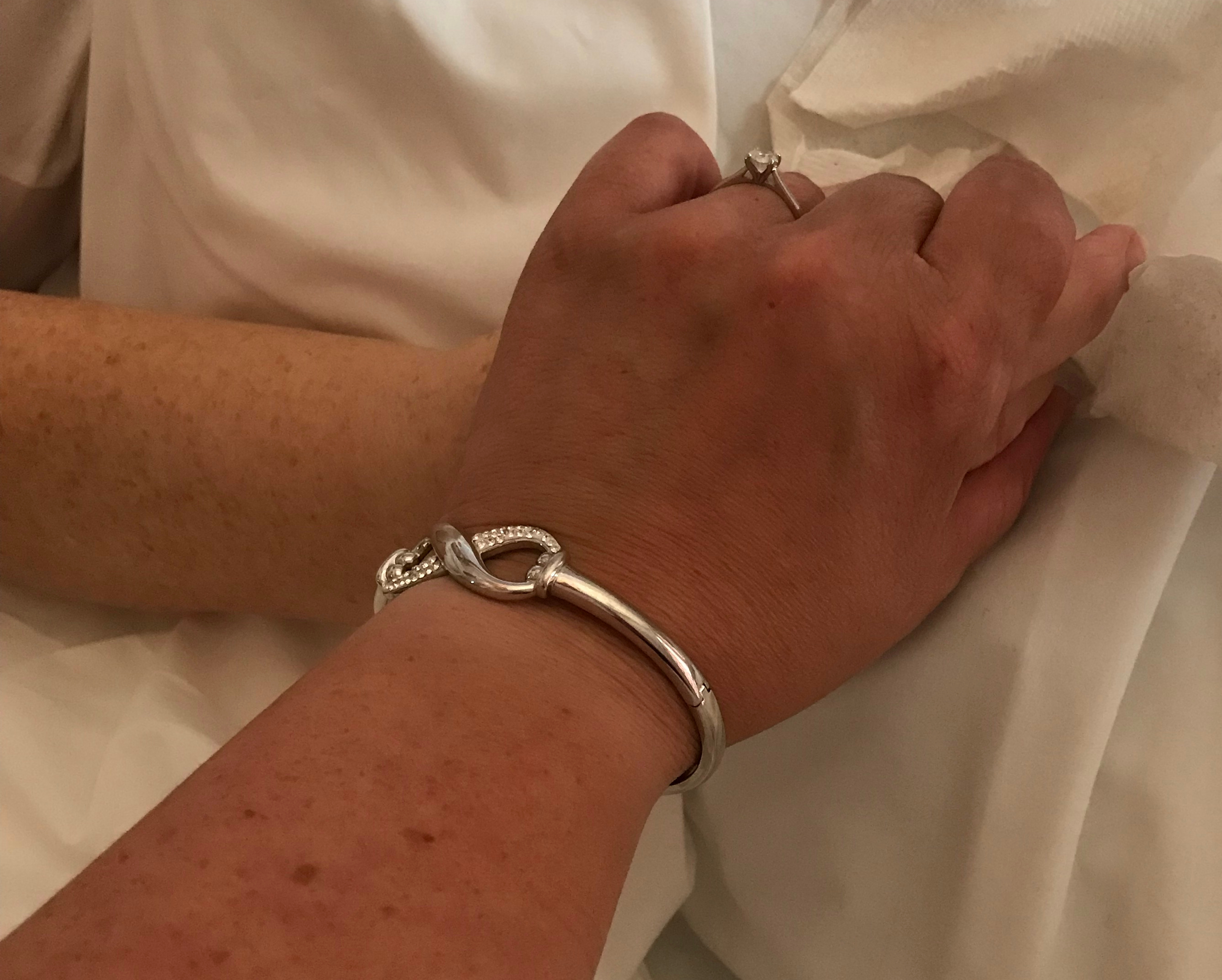 Holding a patients hand