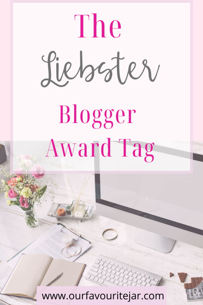 Liebster Blogger desk with computer and notepad 