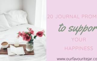 Journal on bed with tray and flowers