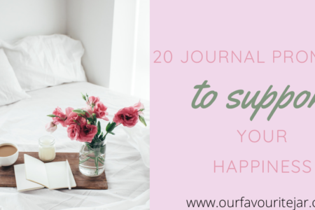 Journal on bed with tray and flowers