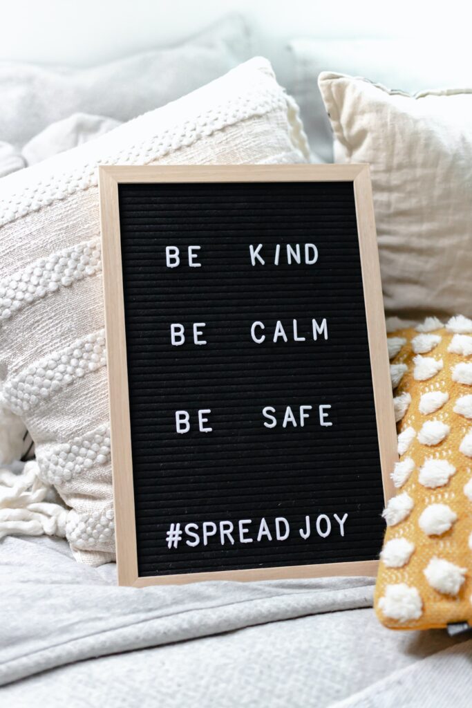 Black board with wooden frame with words Be Kind, Be Calm, Be safe #spreadjoy
Support bloggers