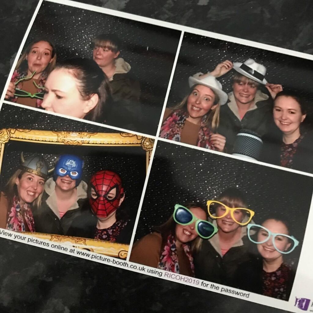 4 small images of 3 women in a photobooth with costumes on
